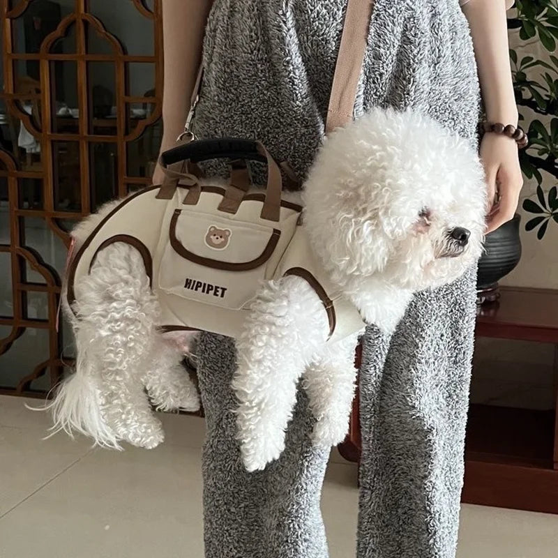 Adjustable outdoor pet carrier bag with harness clip 