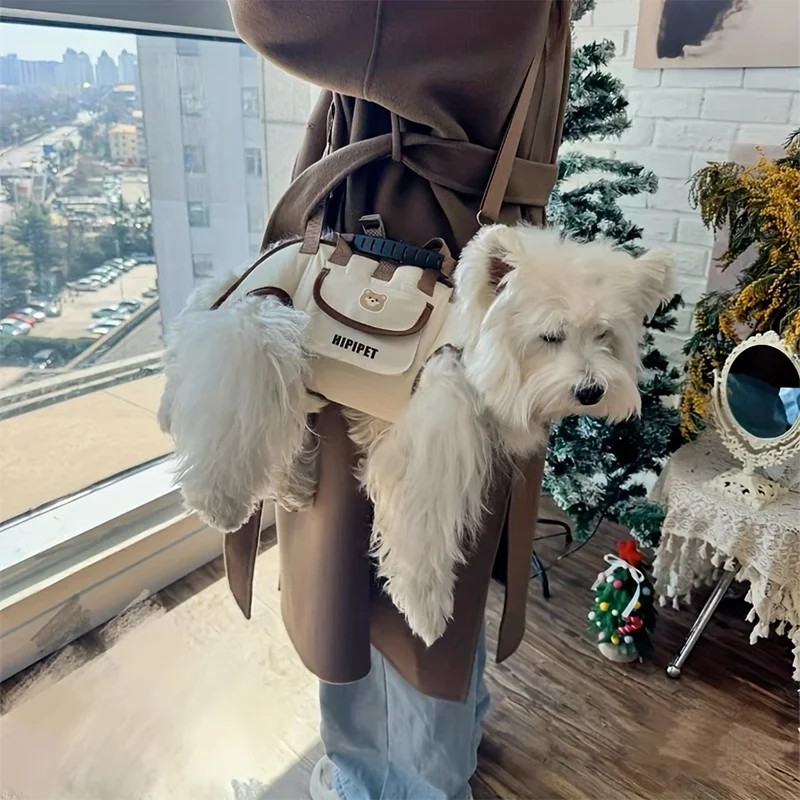 Adjustable outdoor pet carrier bag with harness clip 